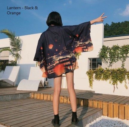 Acrius - Kimono-jasje met 3/4-mouwen en print