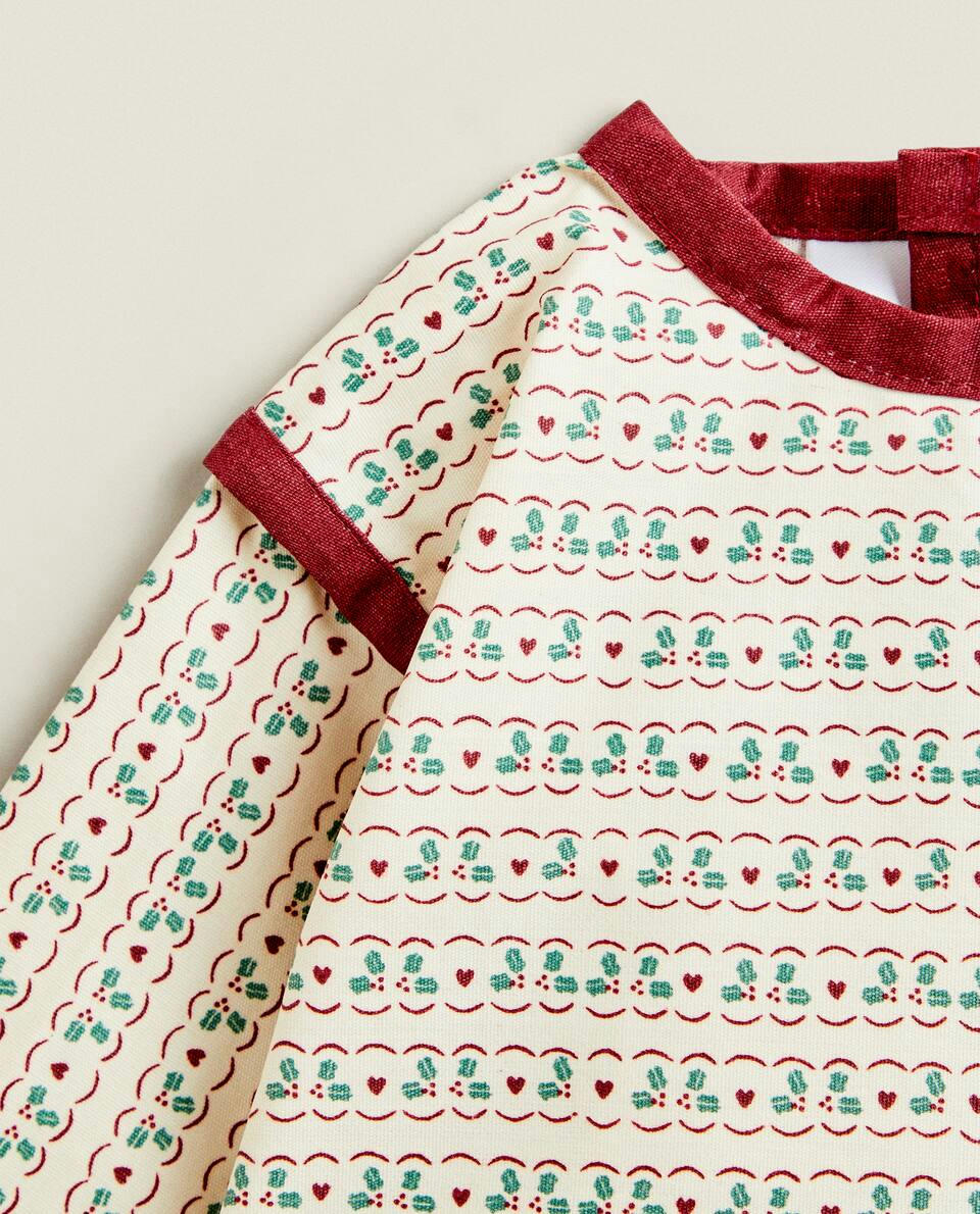 BABADOR INFANTIL DE NATAL COM MANGAS