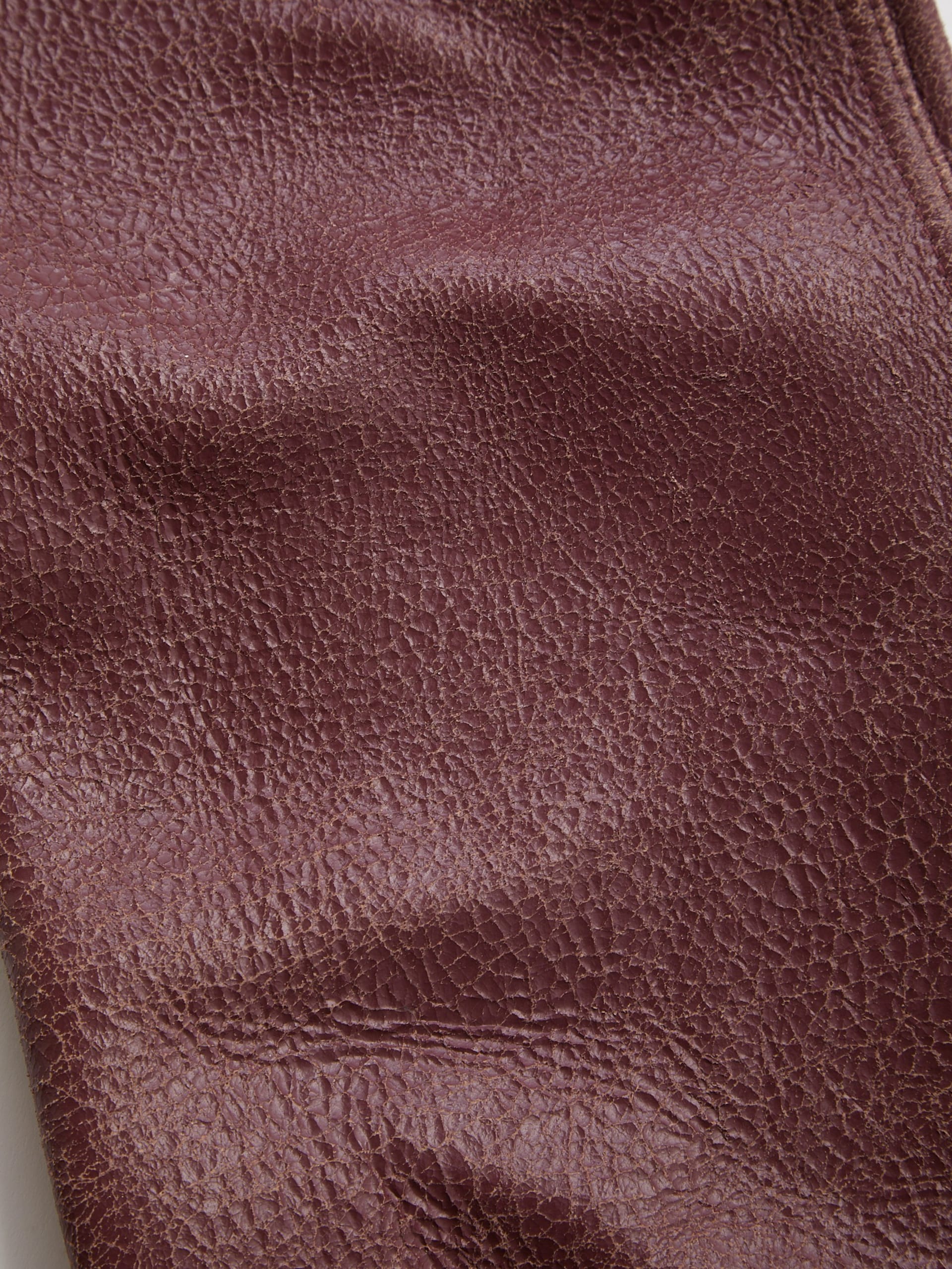 calça de couro craquelado