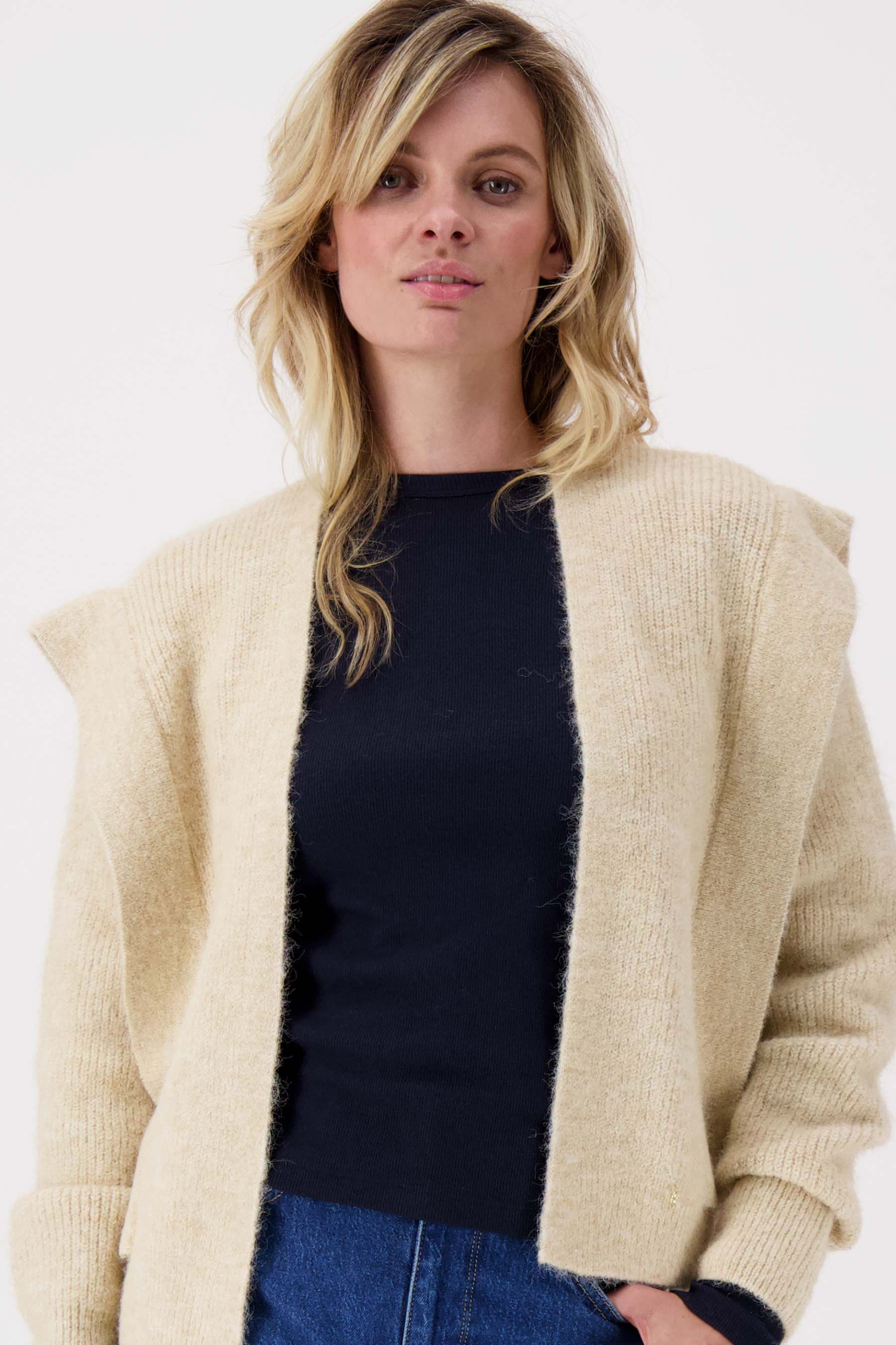 vest met schouder detail