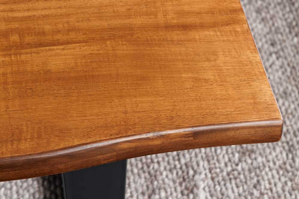Massiver Couchtisch GENESIS 110cm braun Akazienholz Baumkante V-Gestell