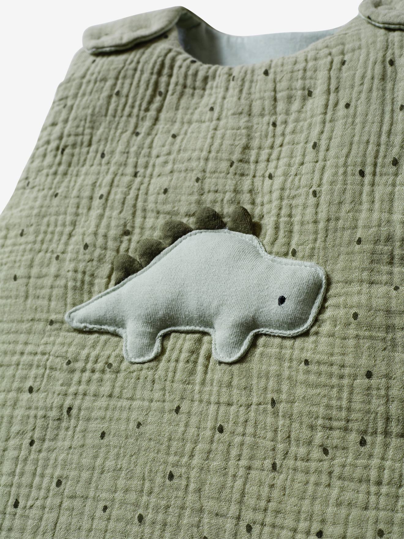 Cardigã sem mangas em chiffon de algodão com estampa lisa de dinossauros em verde médio.