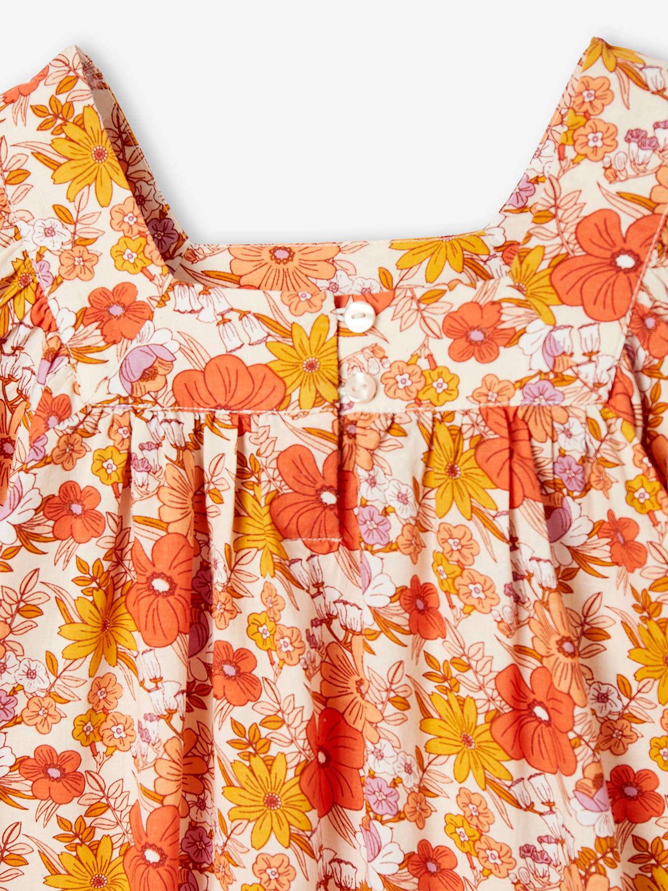 Blusa nude com estampa floral e mangas borboleta para meninas