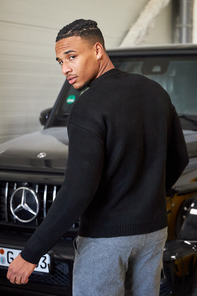 Pull noir en maille à logo 