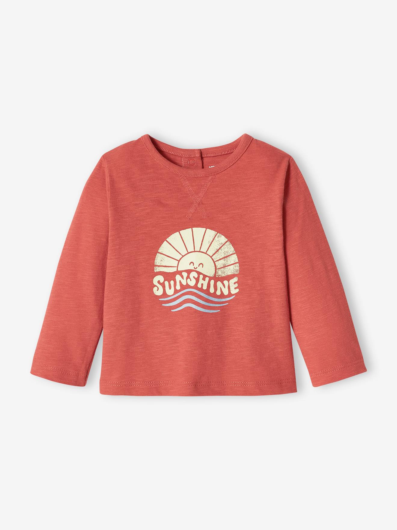 Camiseta infantil de manga comprida em malha texturizada na cor terracota.