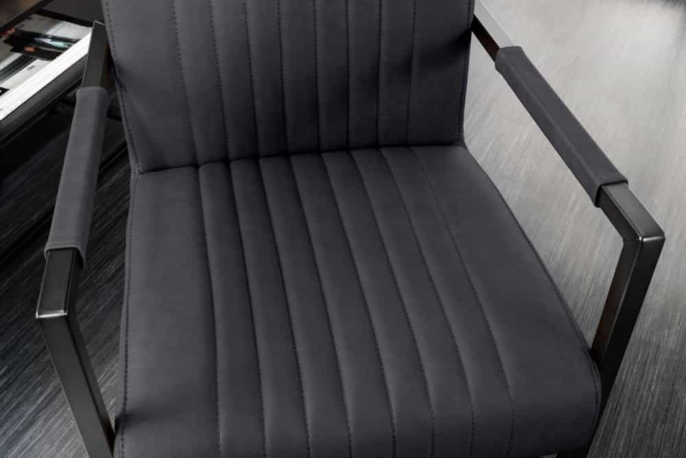 Moderner Freischwinger Stuhl BIG ASTON Echtleder schwarz Taschenfederkern Metall