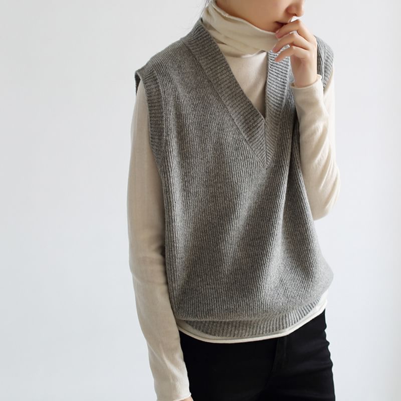 Omibayo - V-hals effen geribbeld vest