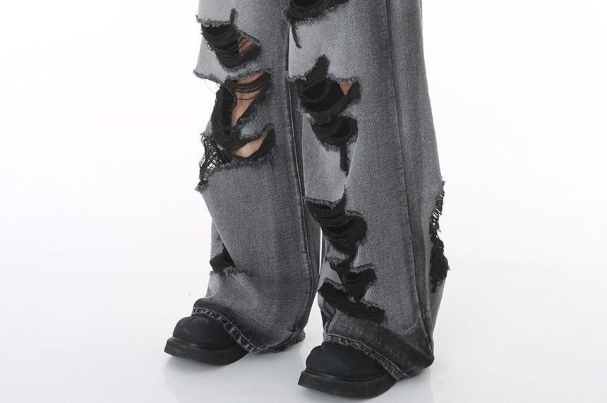 FAERIS - Middelhoge, versleten jeans met wijde pijpen