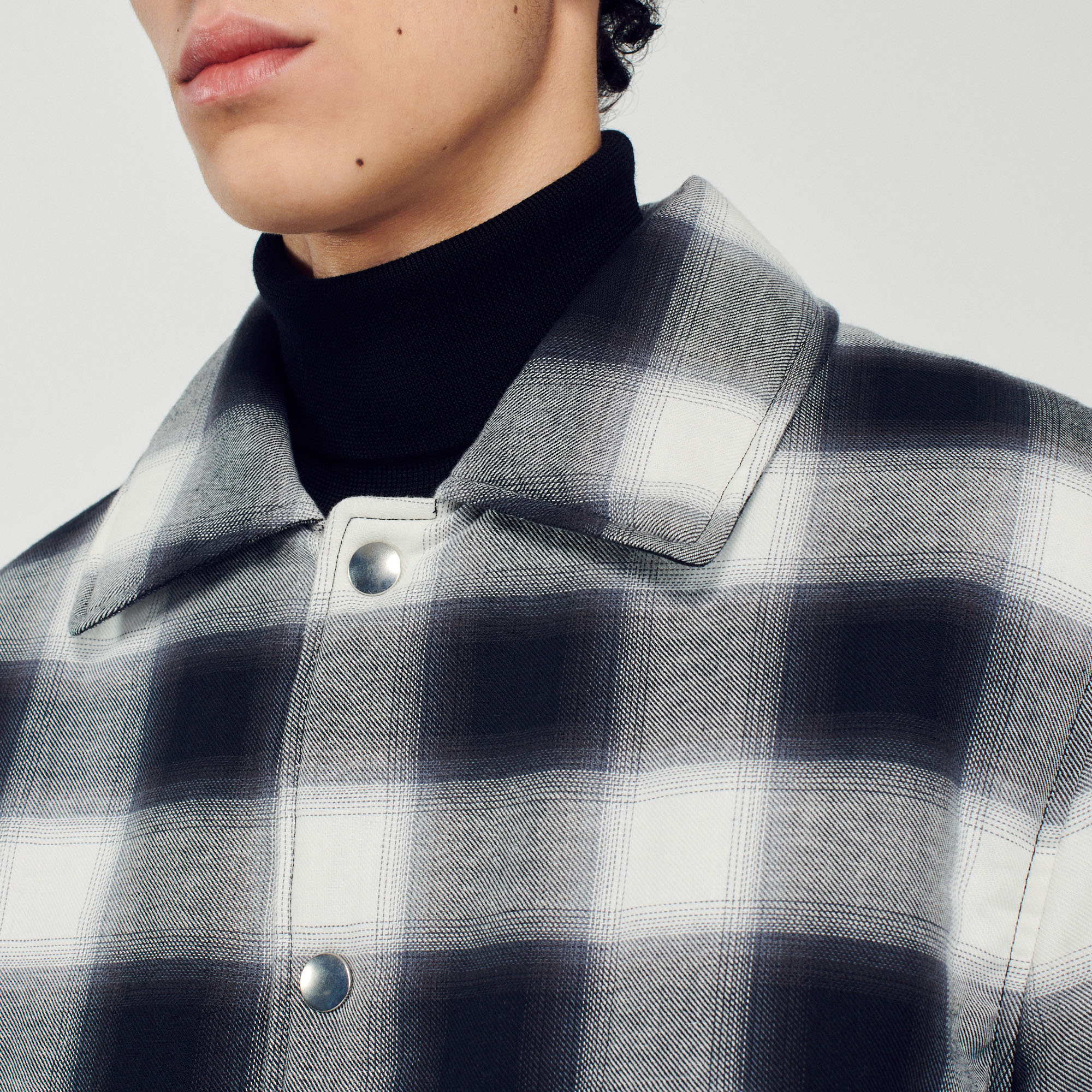 Blouson matelasse á carreaux