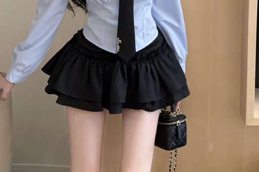 NENE - Overhemd met lange mouwen, contrastkraag, geborduurde letters, knoopjes, stropdas, gelaagde rok met hoge taille, set