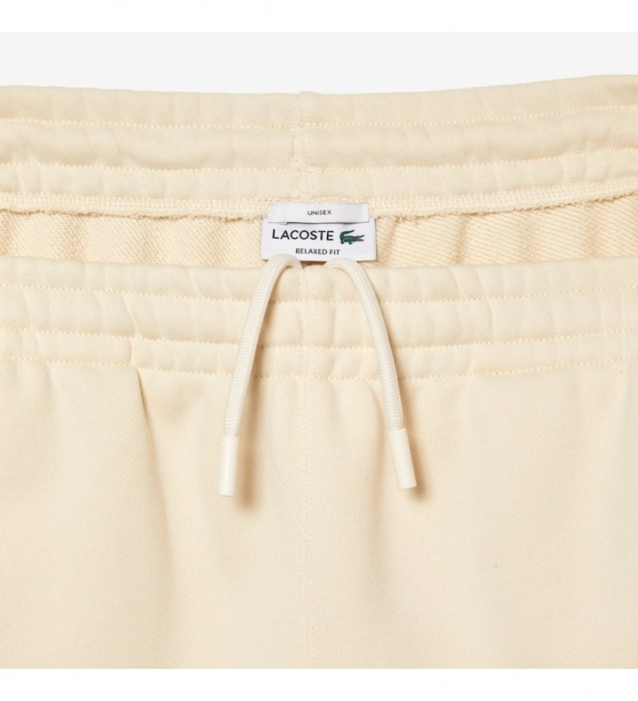 Calça de treino Lacoste unissex em fleece bege.