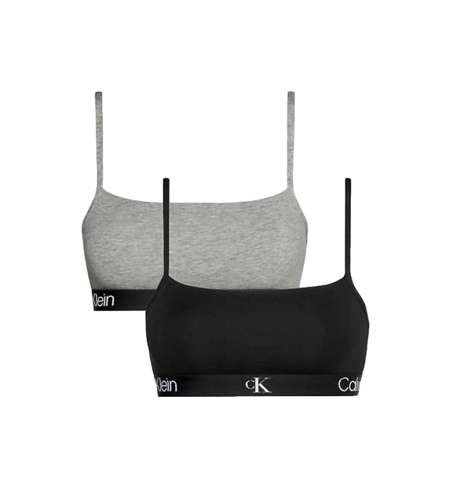 Conjunto de dois sutiãs Calvin Klein, modelo 1996, cinza e preto.