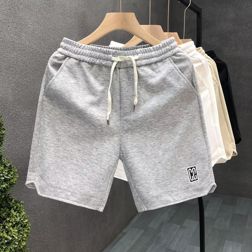Mokoloko - Sweatshorts met trekkoord en letterprint