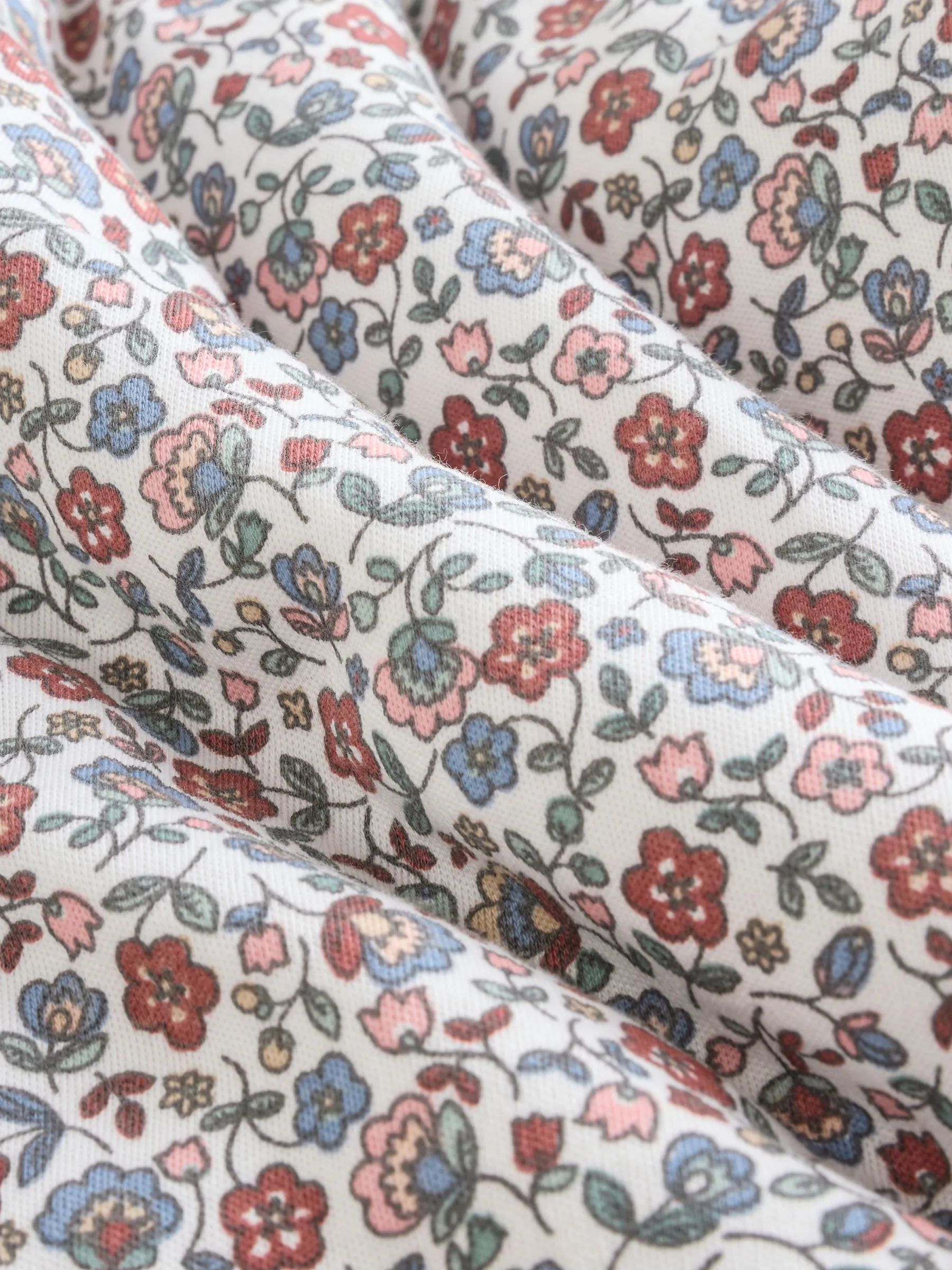 Ecru met bloemenmotief - 2.5 TOG gewatteerde babypyjama