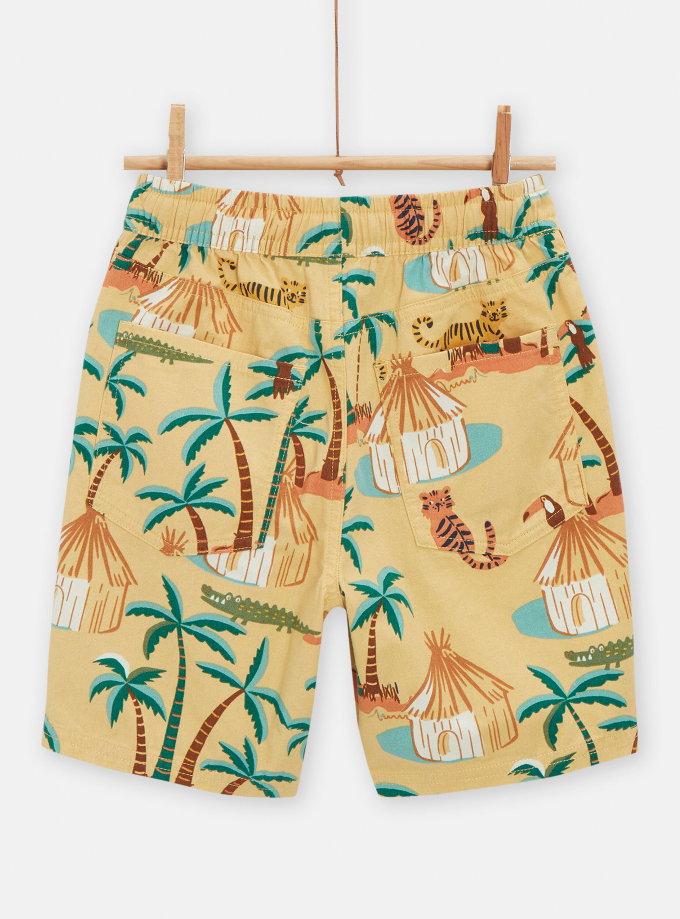 Boy's pale yellow Bermuda shorts with savannah print