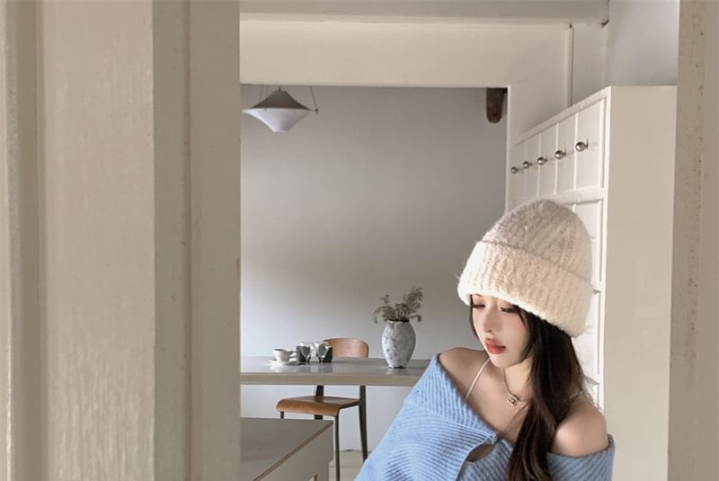 Letme - Effen coltrui met knoopjes en cropped mouwen