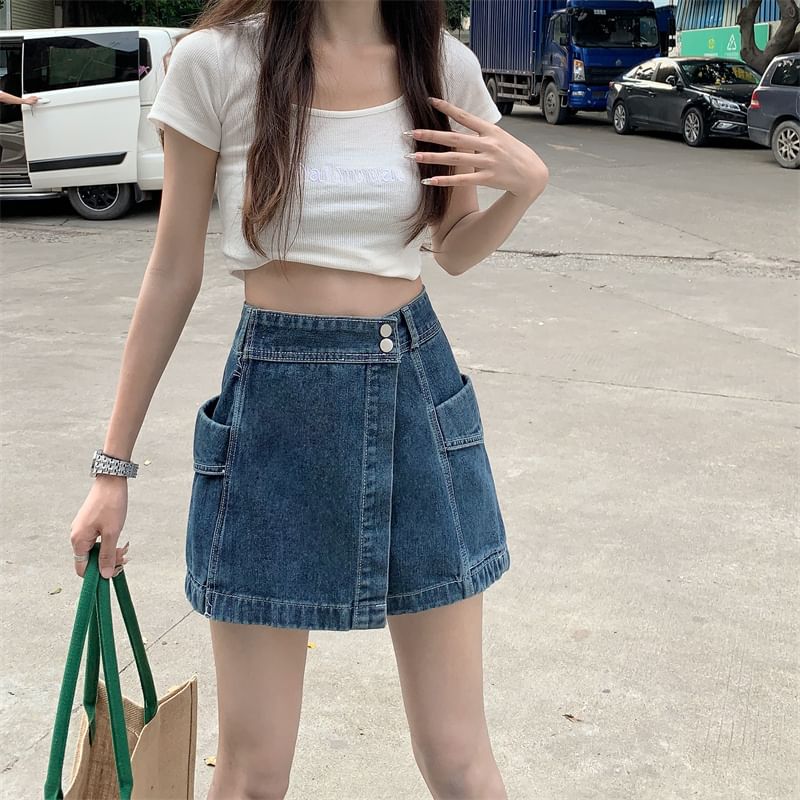 Moon City - Asymmetrische, gewassen denim skort met hoge taille