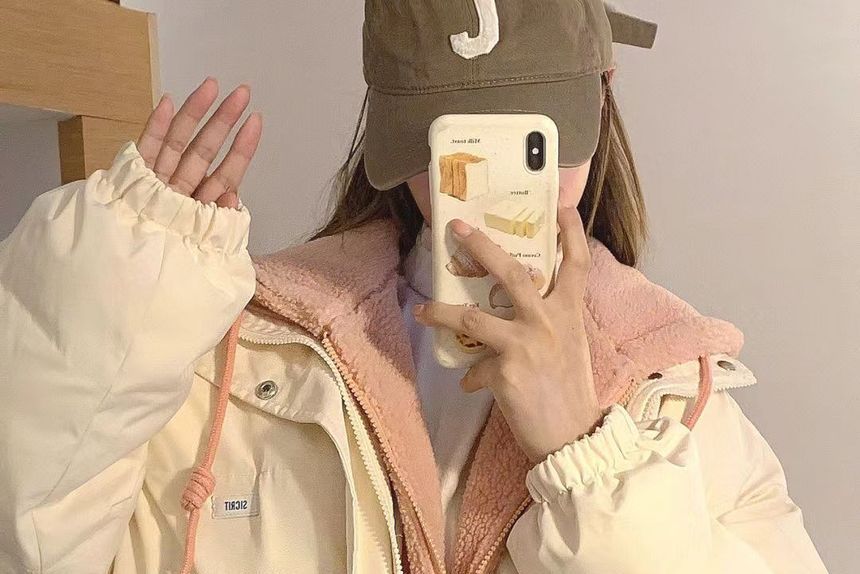 Cerauno - Tweekleurige applicatie met capuchon en neppe tweedelig oversized gewatteerd jack met rits