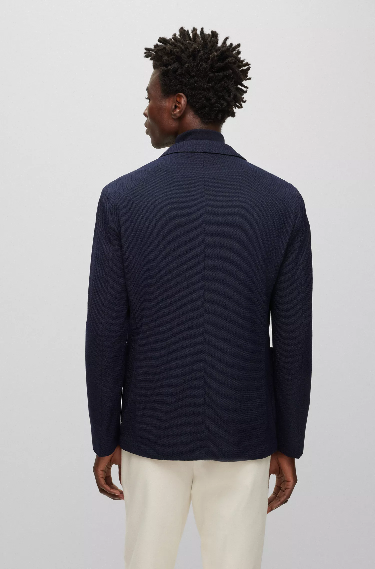 Jaqueta BOSS preta de corte slim com abotoamento duplo em mistura de lã.