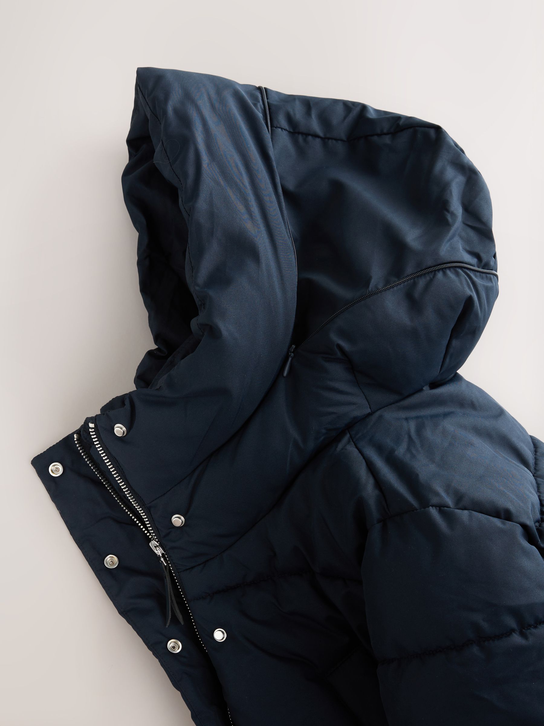 Donkerblauw - Regenbestendige gewatteerde jas met capuchon
