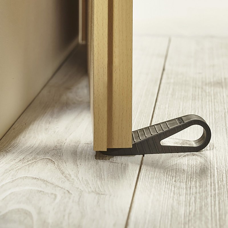 Cale et butée de porte et fenêtre