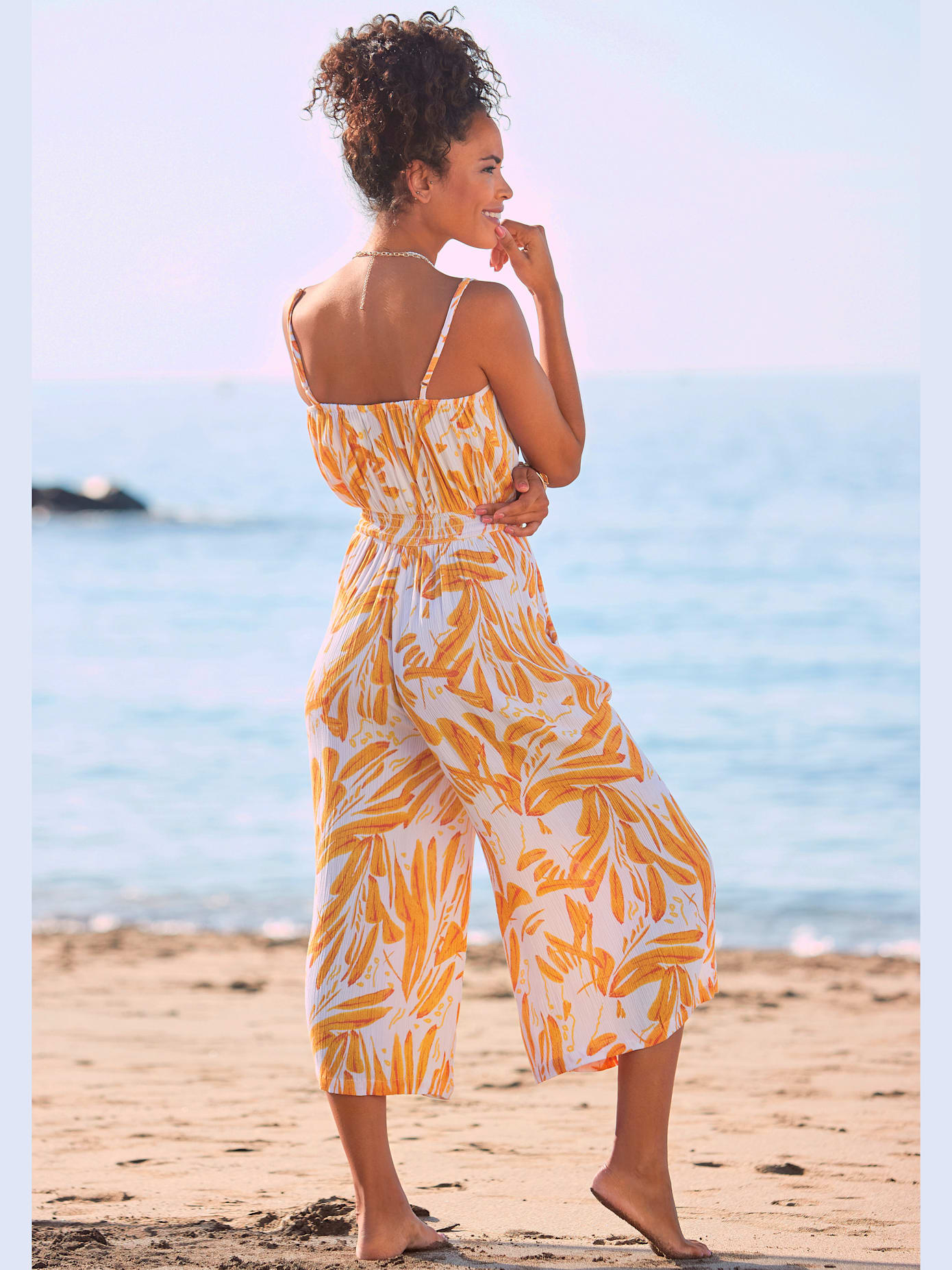 Combinaison jupe-culotte belle encolure en v