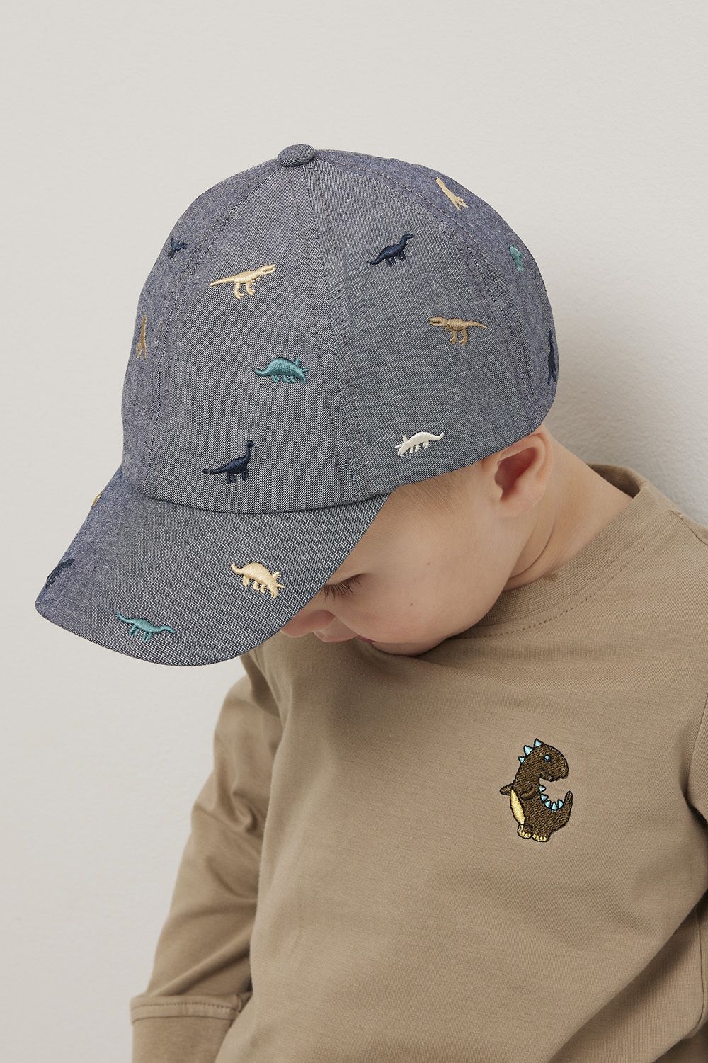 Caps med broderi Dino World