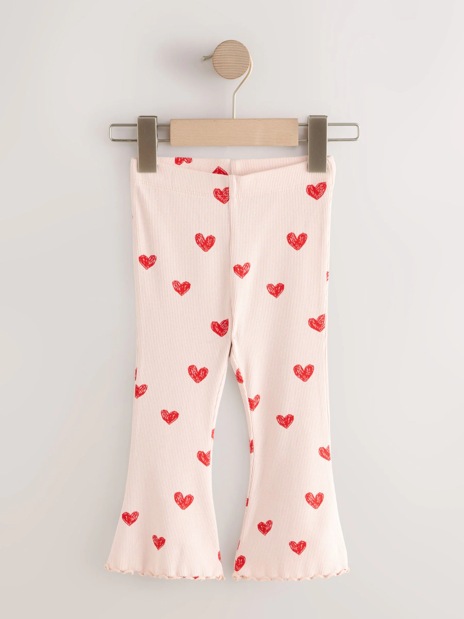 Lichtroze met hartje - Geribbelde flare legging (3 mnd-7 jr)