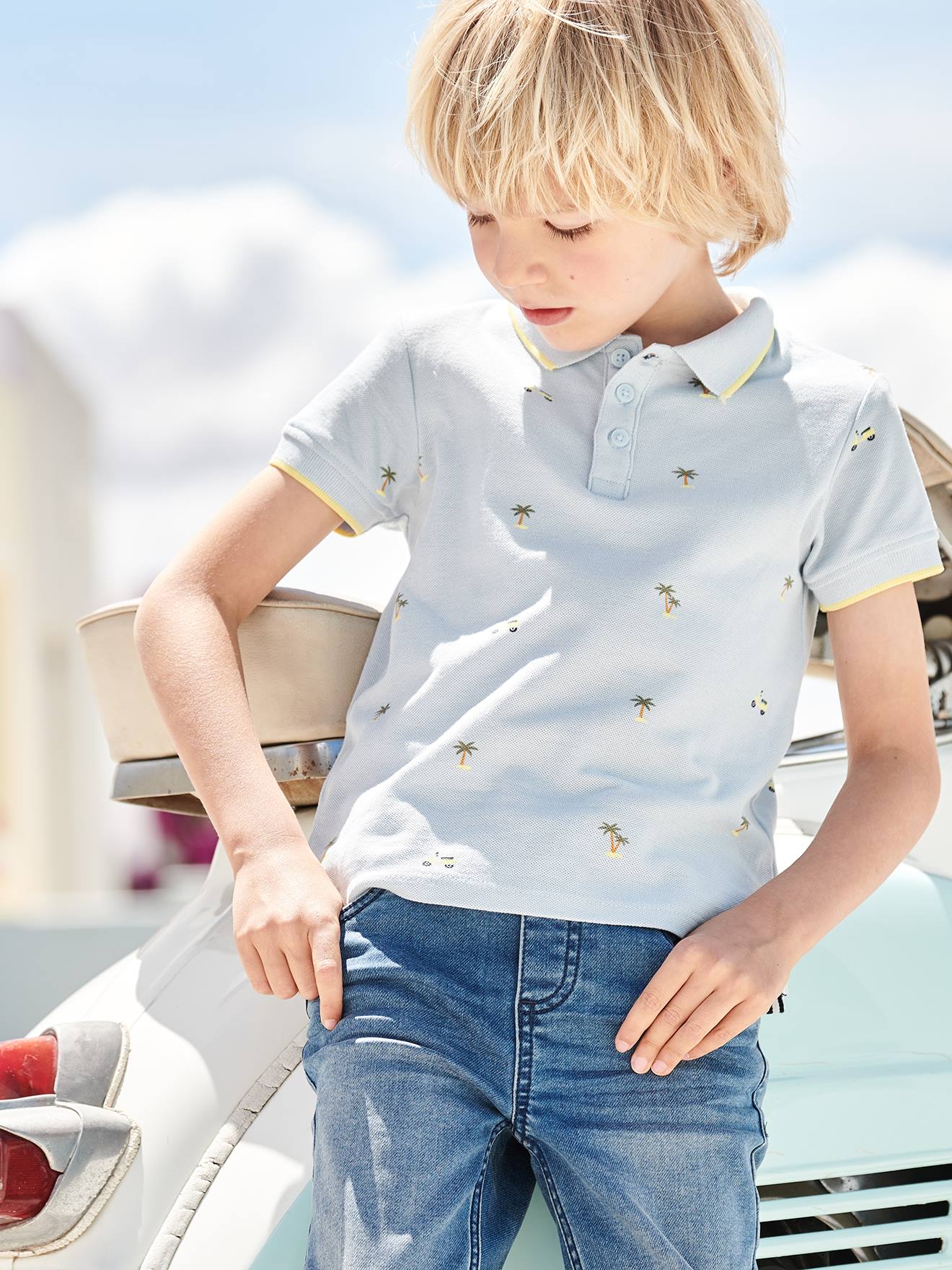 Camisa polo azul estampada em malha piqué para meninos