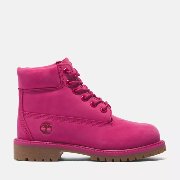Bota Timberland Premium de 6 polegadas impermeável, edição 50, para jovens, na cor rosa escuro.