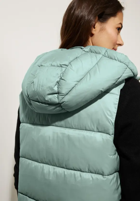 Lange Steppweste mit Kapuze - polar mint