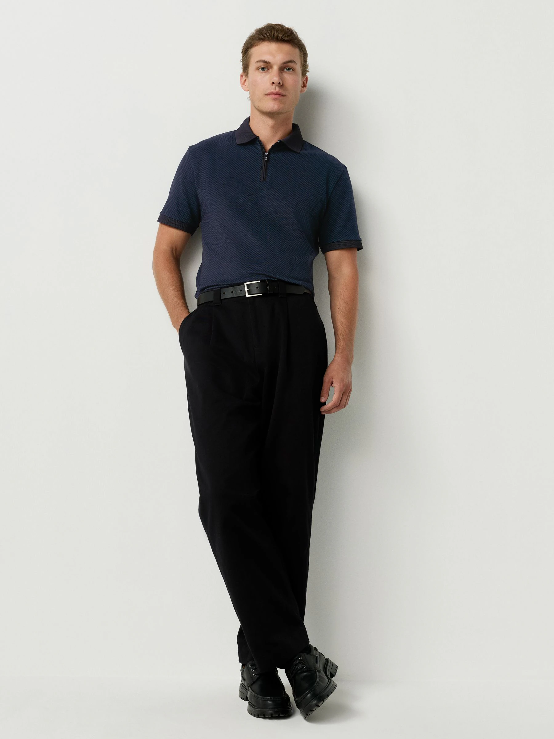 Blauwgroen - Modieus poloshirt met kwartrits