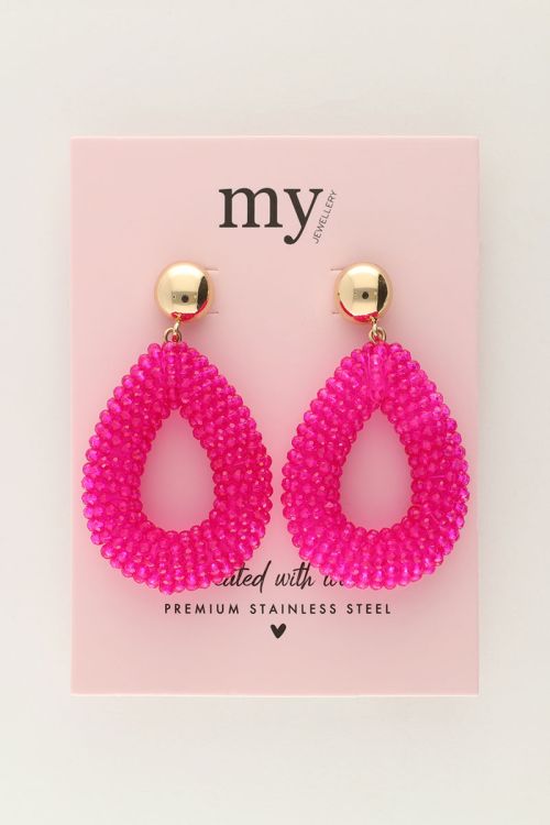 Roze statement oorbellen met steentjes