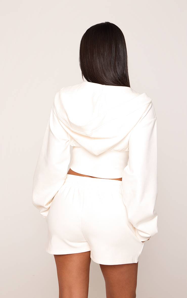 Crème Sweat À Casynthétiqueche Court Petite Avec Taille Cintrée Zippé Et Broderie Entrelacée