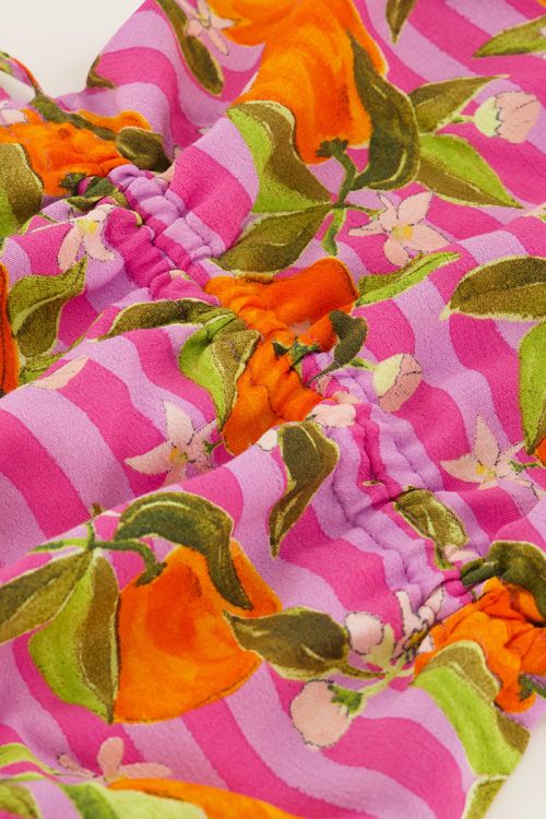 Roze crop top met sinaasappel print