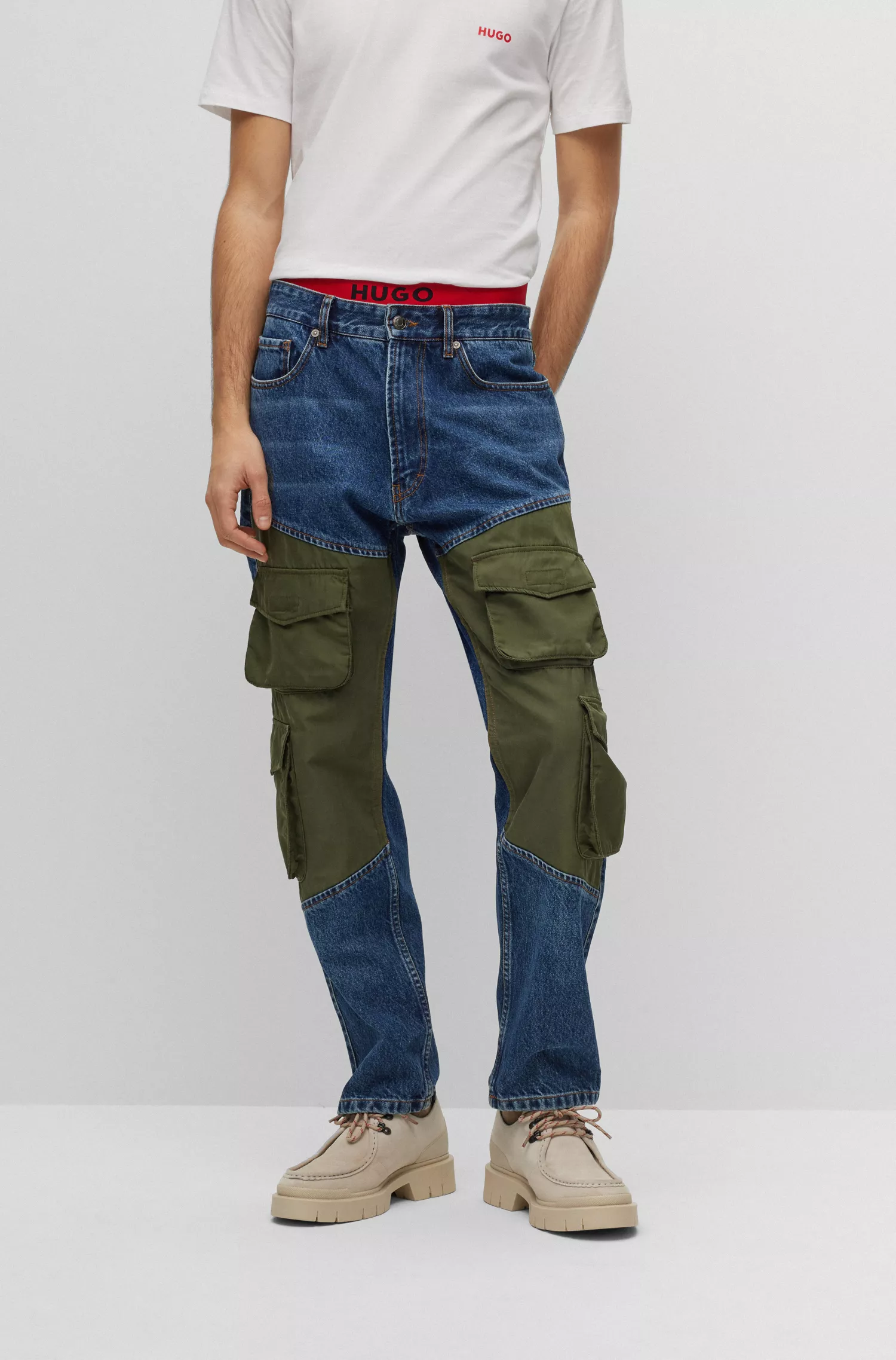 Calça jeans HUGO Red-Hybrid de corte regular em denim rígido azul.
