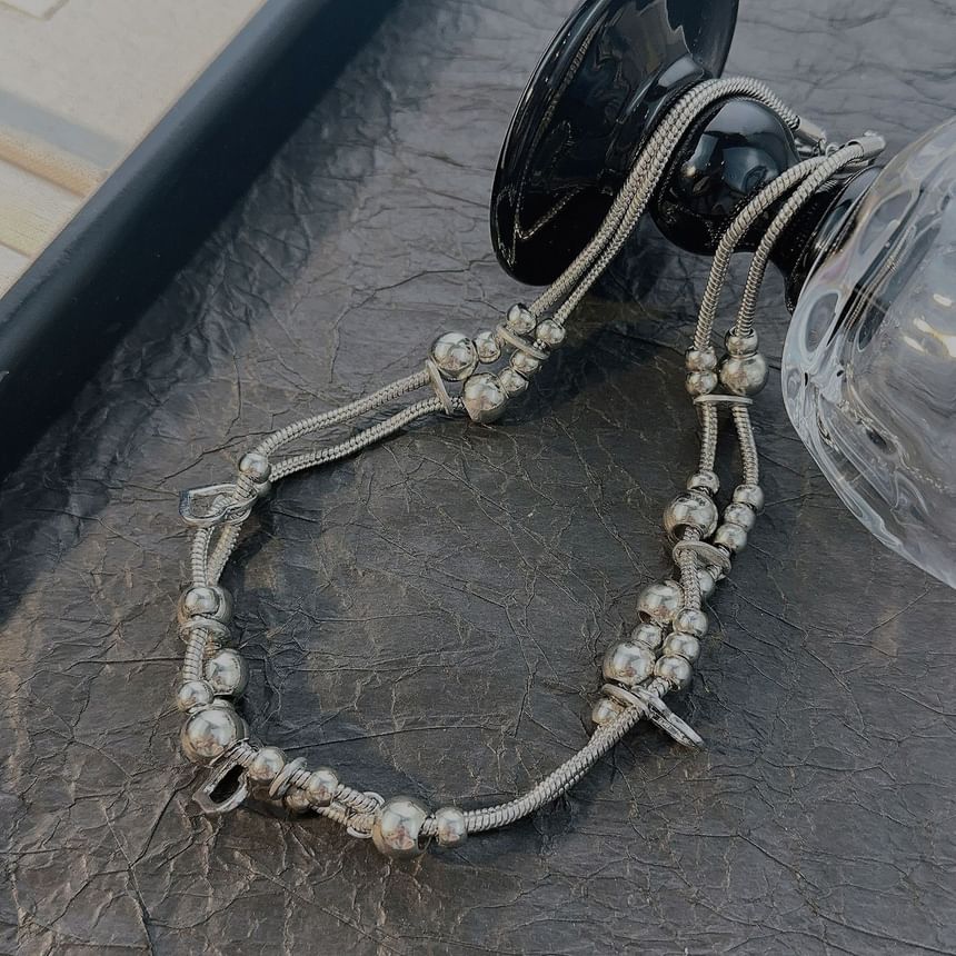Catharsis - Hartvormige kralenketting met laagjes
