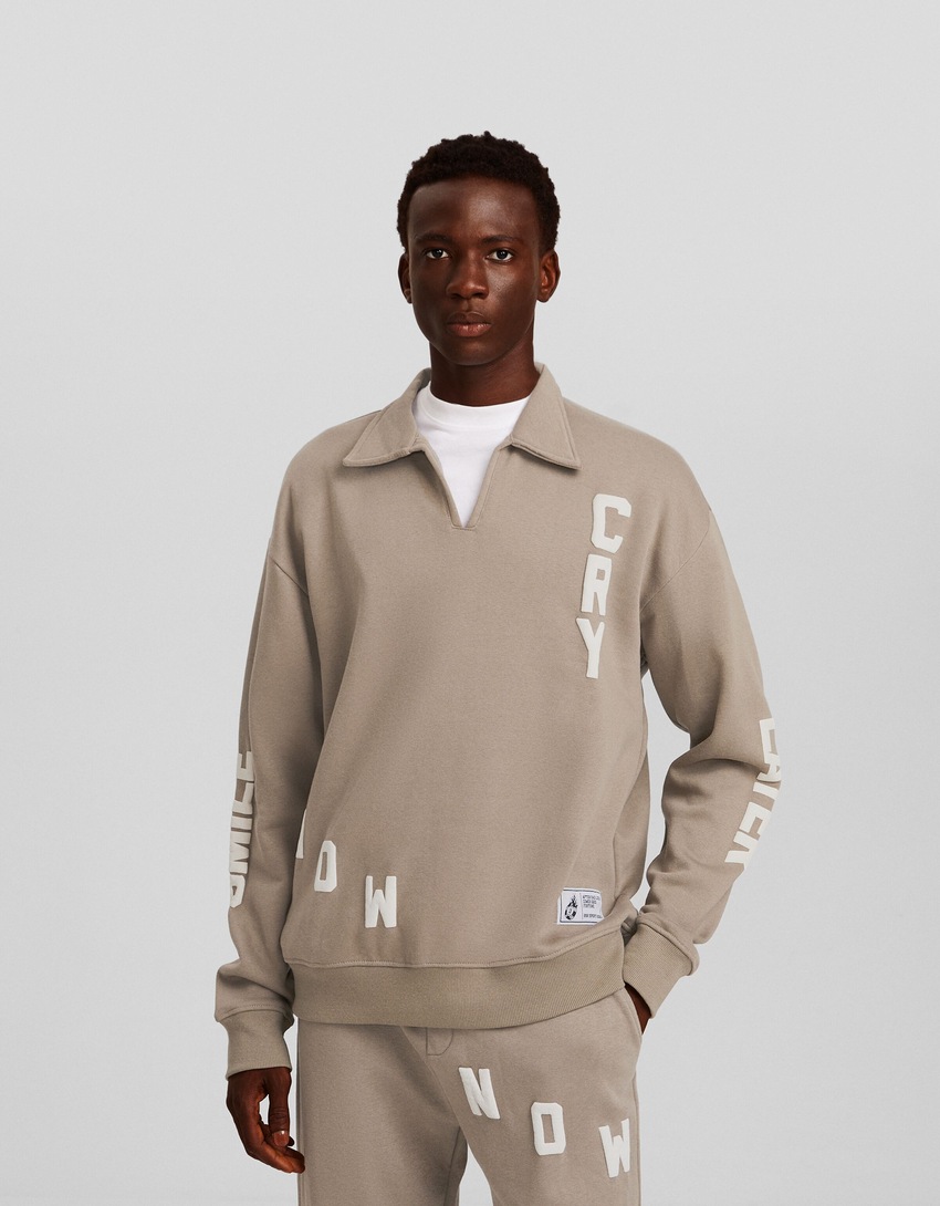 Moletom estampado com gola polo