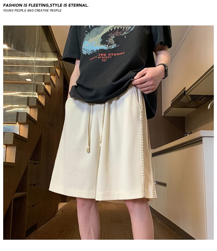 Tiaota - Contrasterende gestikte shorts met gemiddelde taille