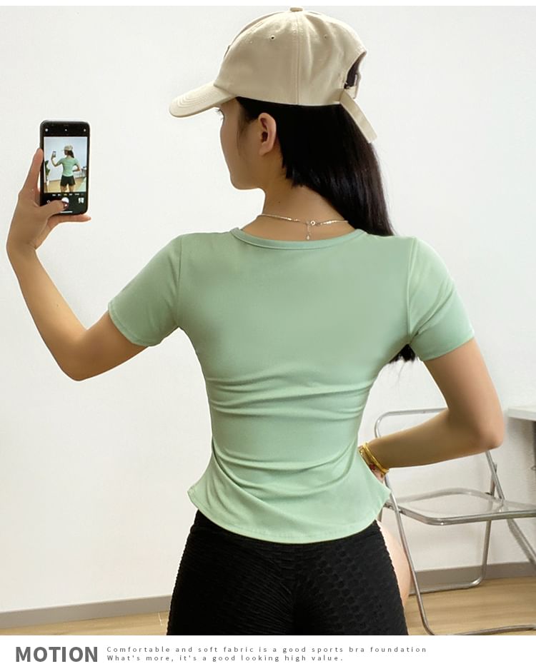 Engiko - Sport-T-shirt met korte mouwen en inkeping in de hals, effen en asymmetrisch