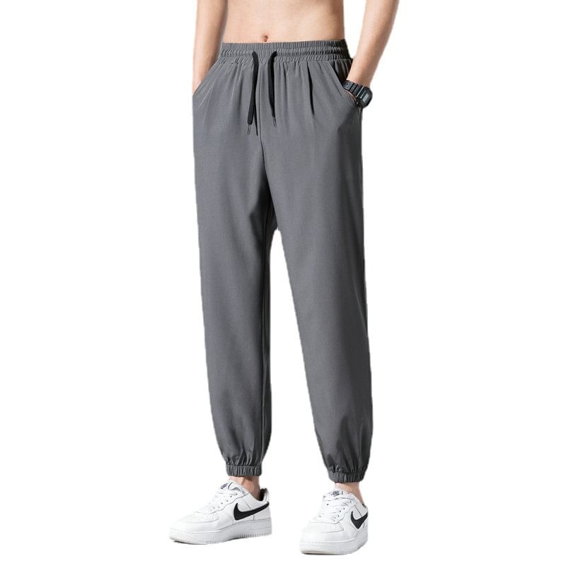Acrius - Effen cropped harembroek met trekkoordtaille