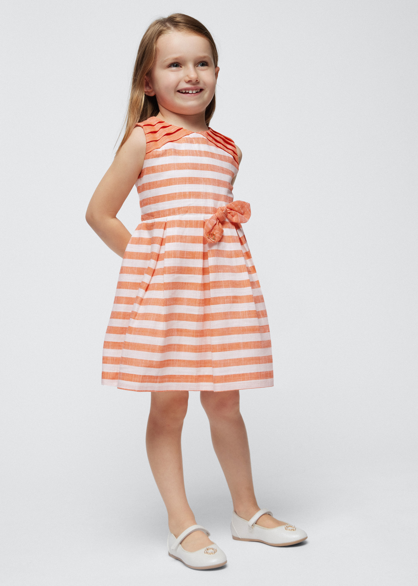 Vestido listrado cor de anis para meninas