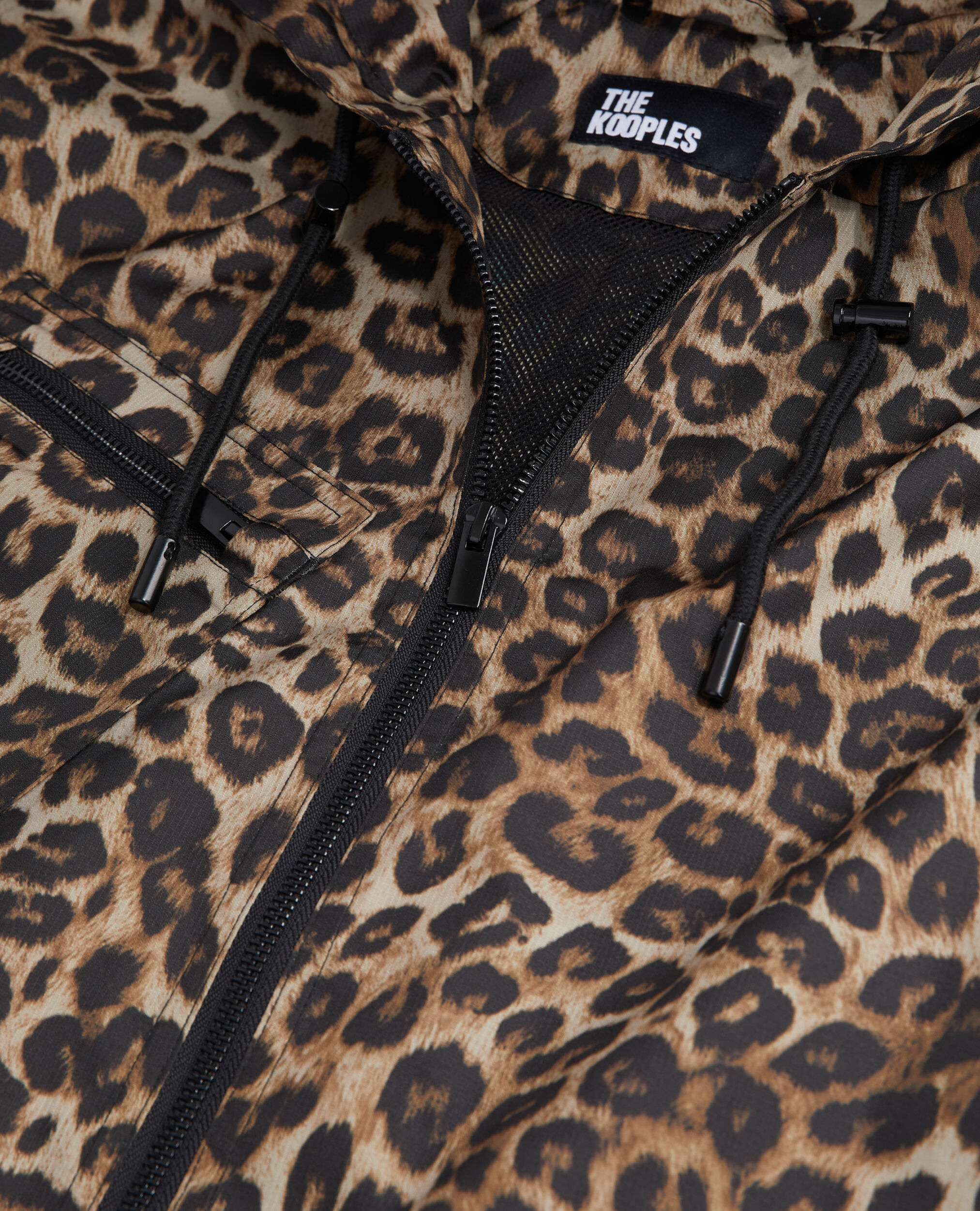 Blouson coupe-vent imprimé à capuche