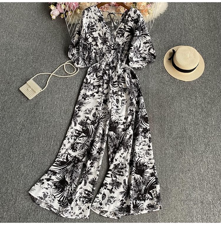 Dudu - Jumpsuit met korte mouwen, V-hals, print en wijde pijpen