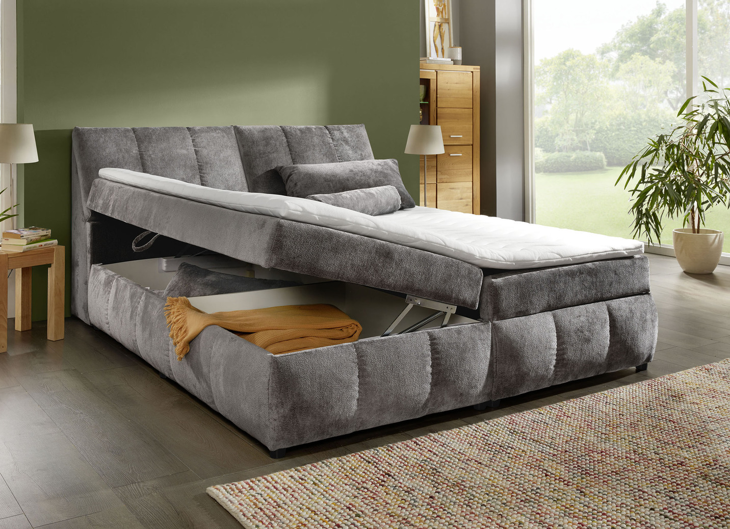 Boxspringbett mit Stauraum im Kopfteil und Bettkasten