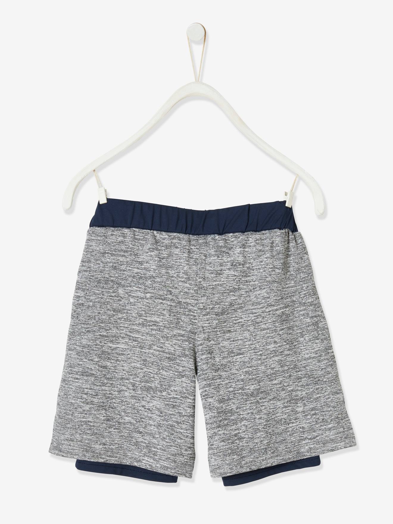 Conjunto esportivo 2 em 1 para meninos, azul escuro liso com estampas.