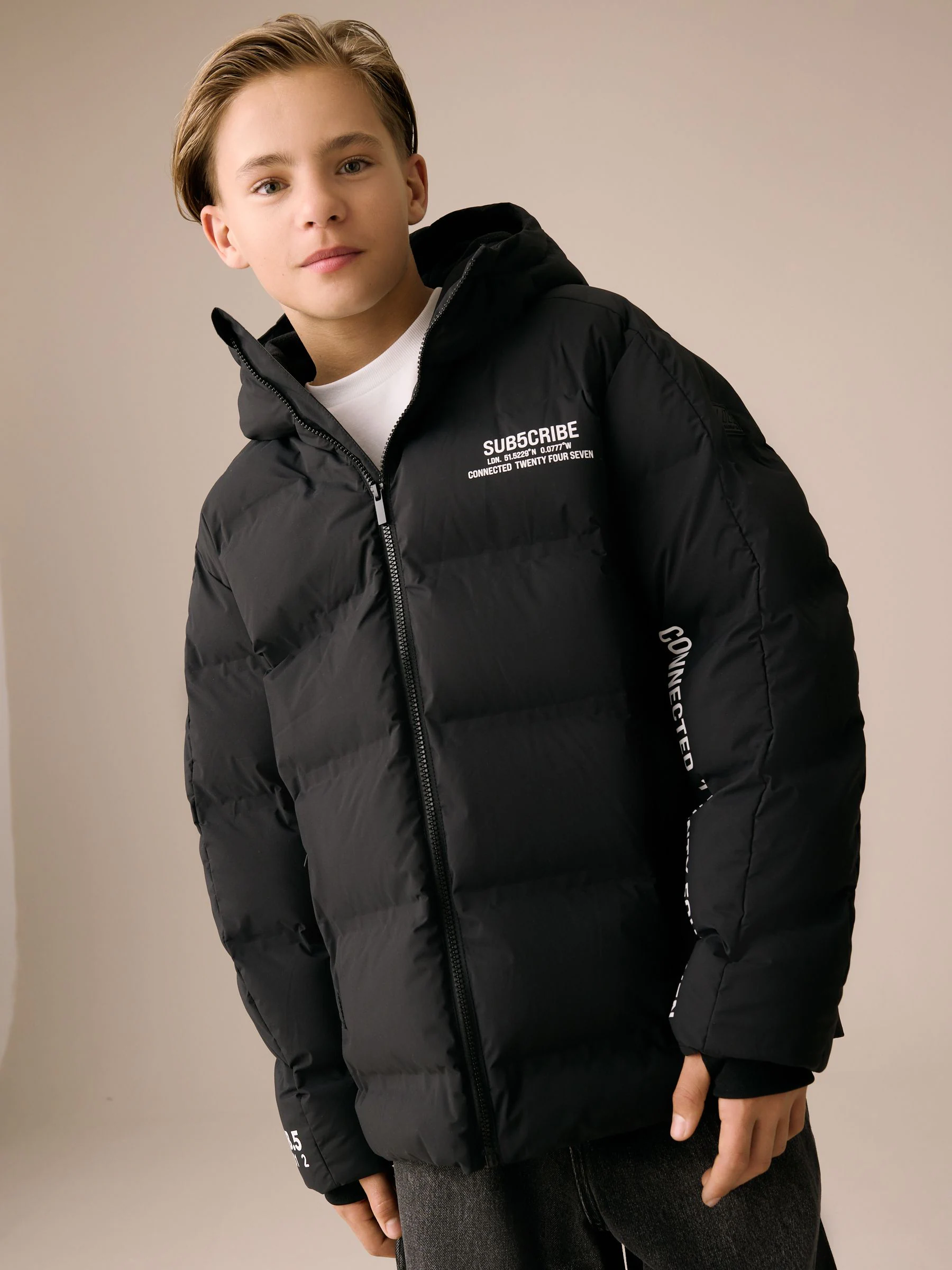 Zwart/wit - Regenbestendige gewatteerde jas met microfleece voering (3-17jr)