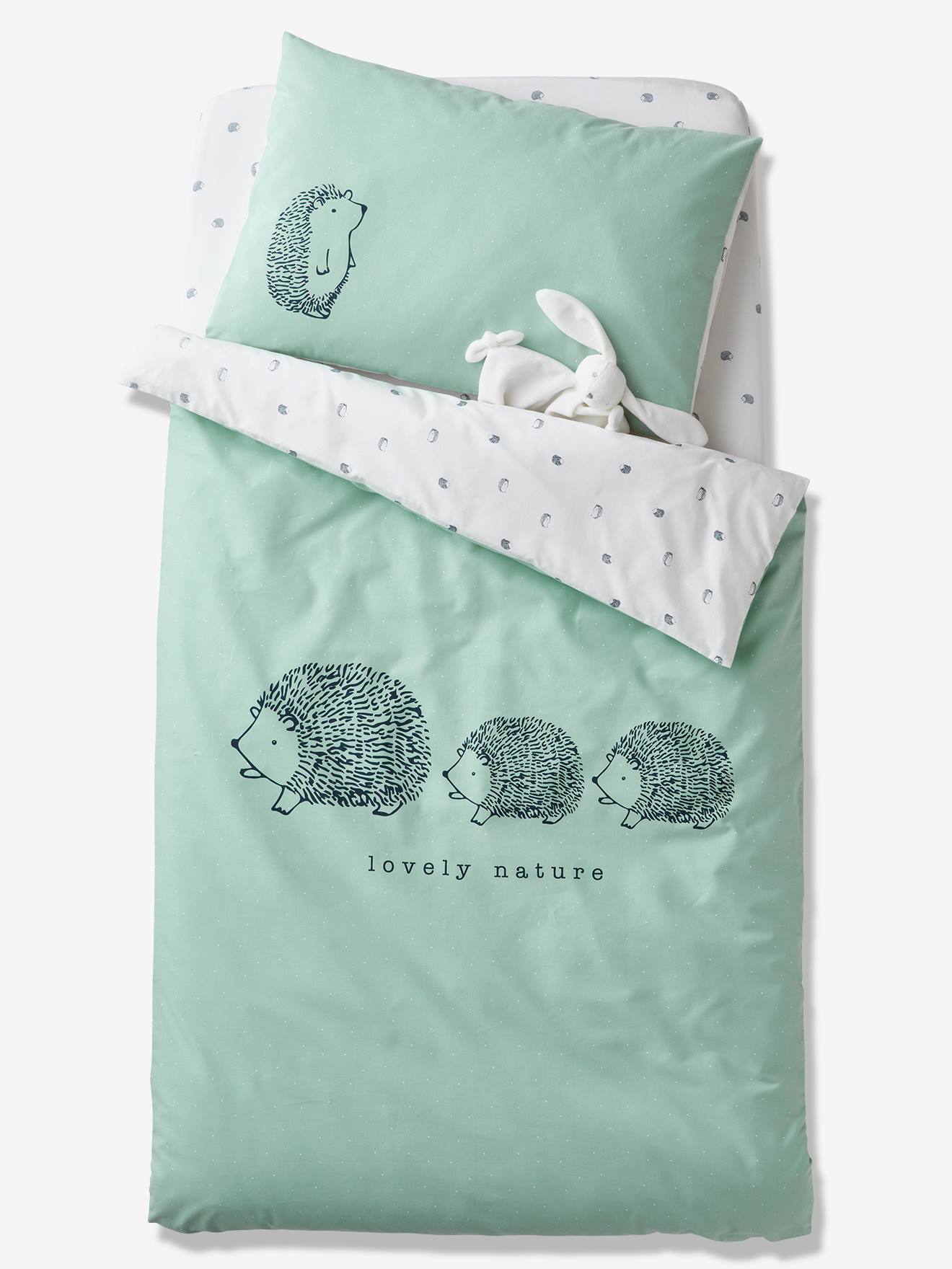 Lençol de bebê com elástico em algodão orgânico, estampa Lovely Nature em branco claro.