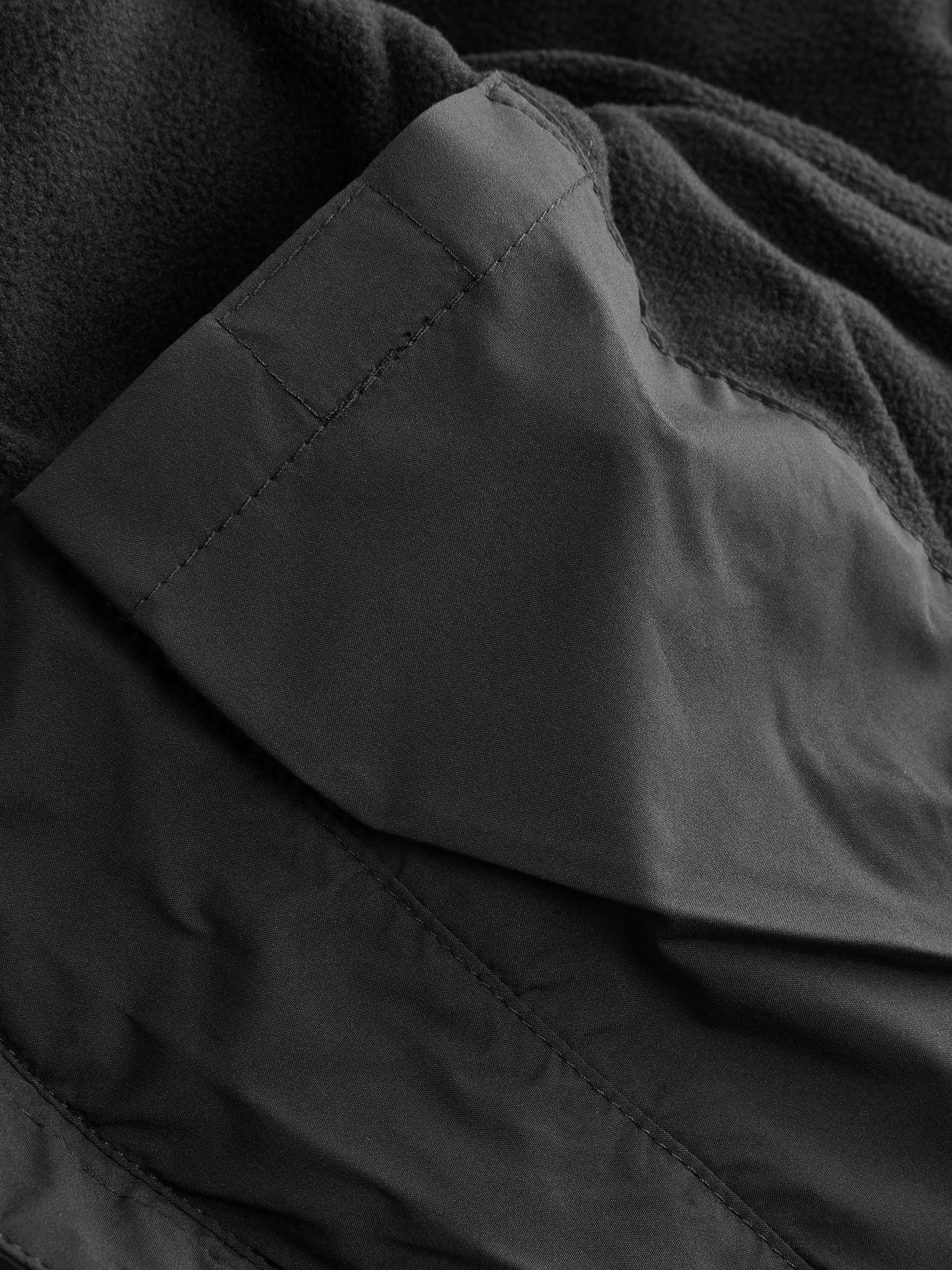 Zwart - Regenbestendige gewatteerde jas met microfleece voering (3-17jr)