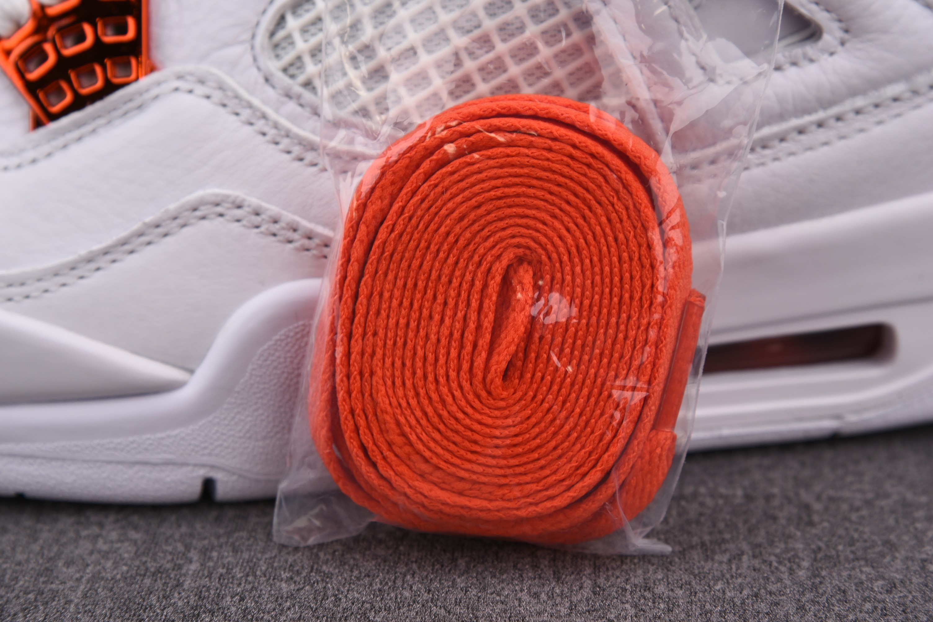 Jordan 4 Retro Metallic Orange